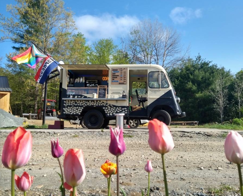 UV Coffee Truck with tulips in the foreground