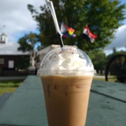 Cold brew in to go cup with whip cream on top